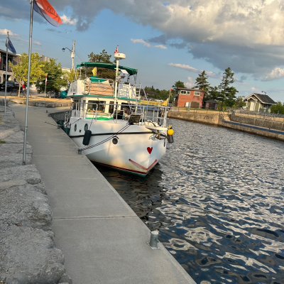 Boat Docked At Stone Pier