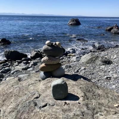 Stone Cairns On Coast